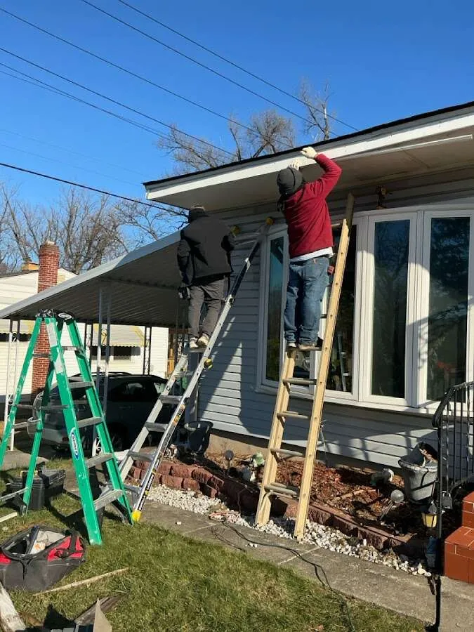 Restoration crew performing exterior repair in Little Chute
