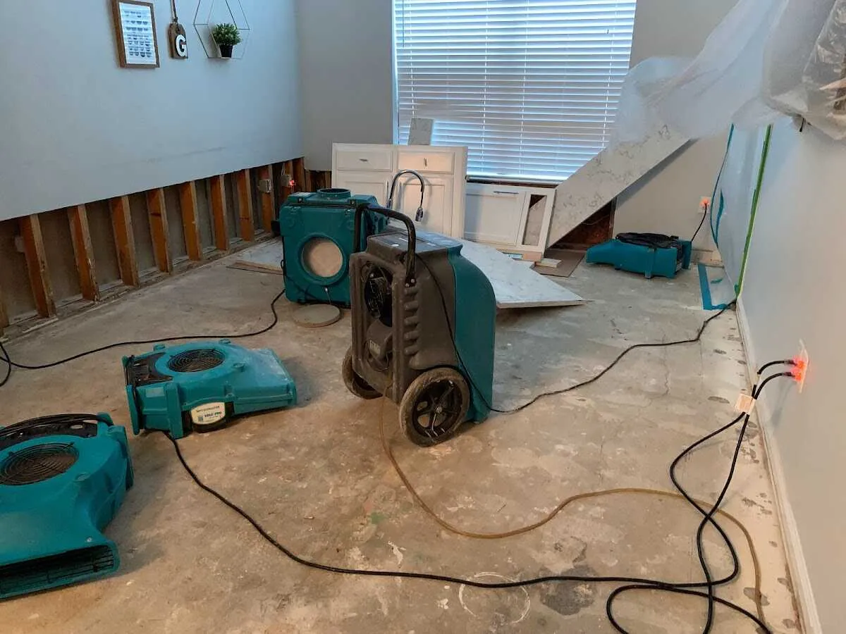 Dehumidifier in flood-cut room for Water Damage Restoration in Little Chute